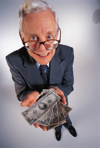 Man with moneybills - www.HowCanIretire.net
